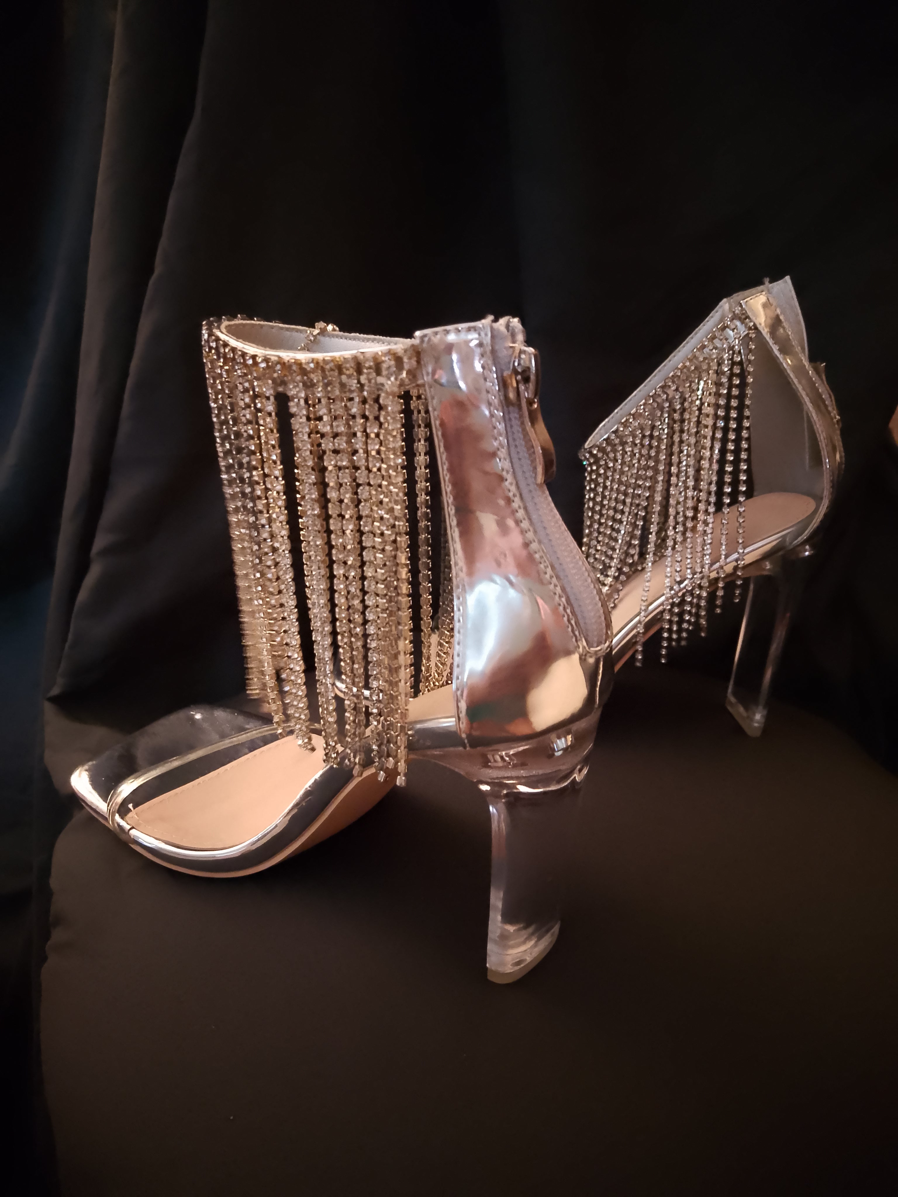 Platinum Sway To The Beat Cascade Tassel Clear Heel Pumps