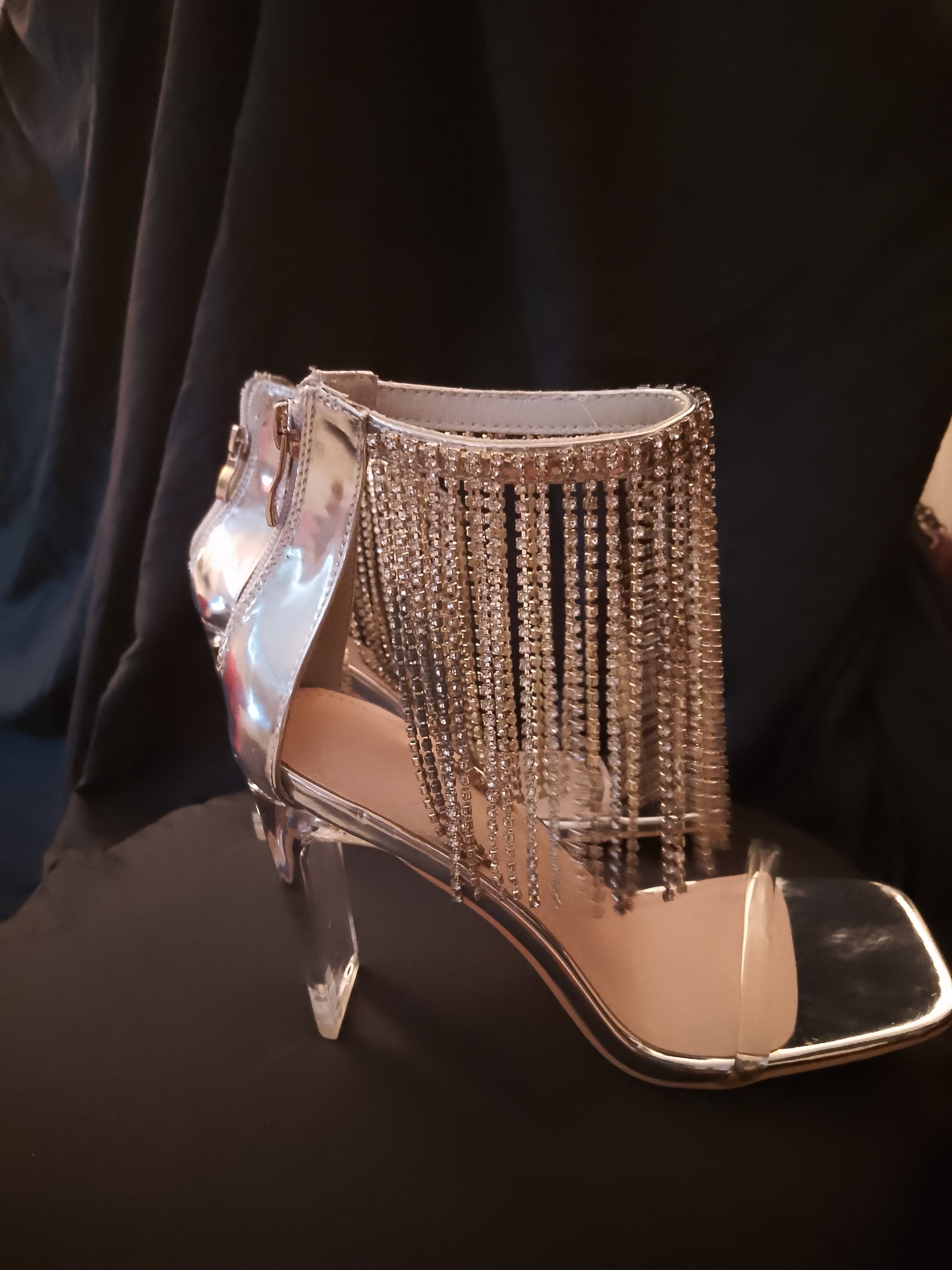 Platinum Sway To The Beat Cascade Tassel Clear Heel Pumps
