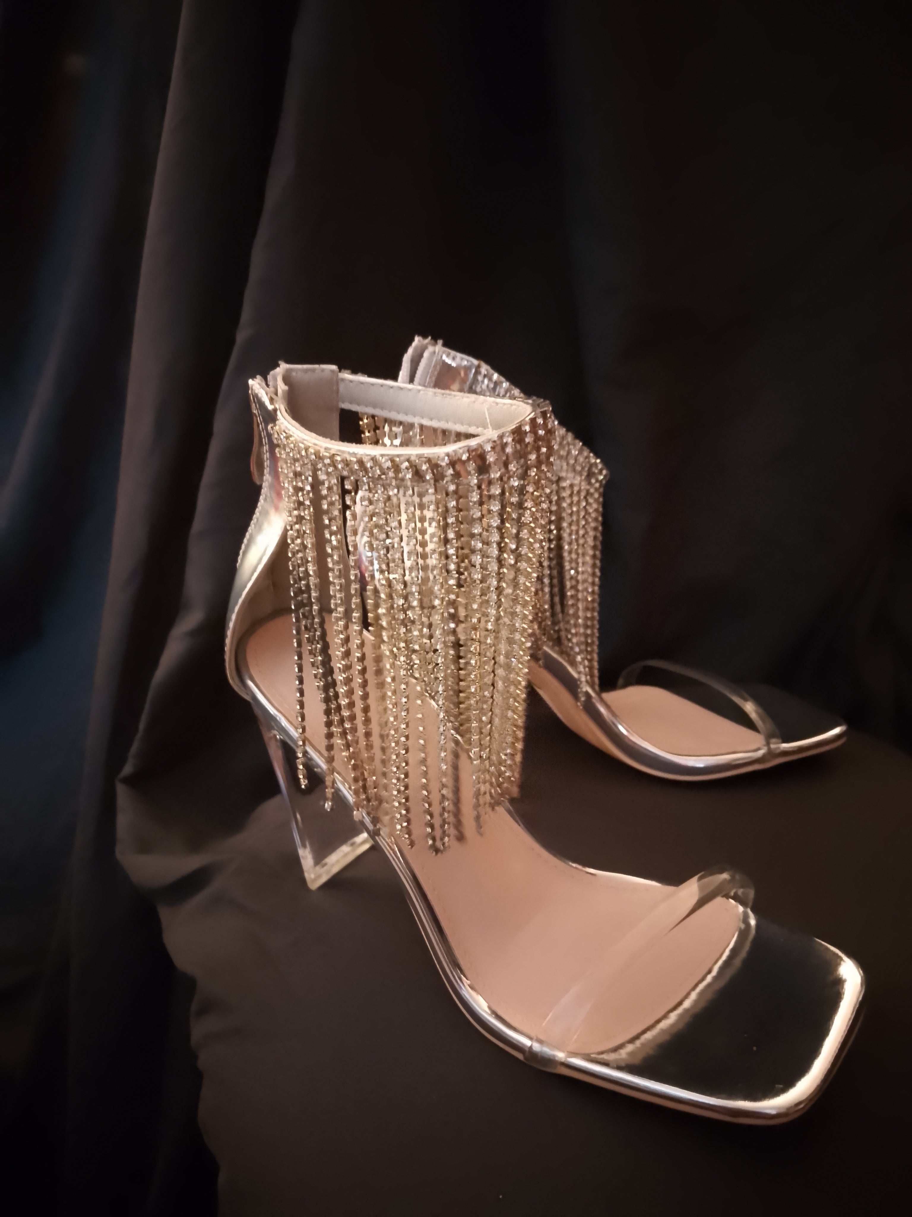 Platinum Sway To The Beat Cascade Tassel Clear Heel Pumps