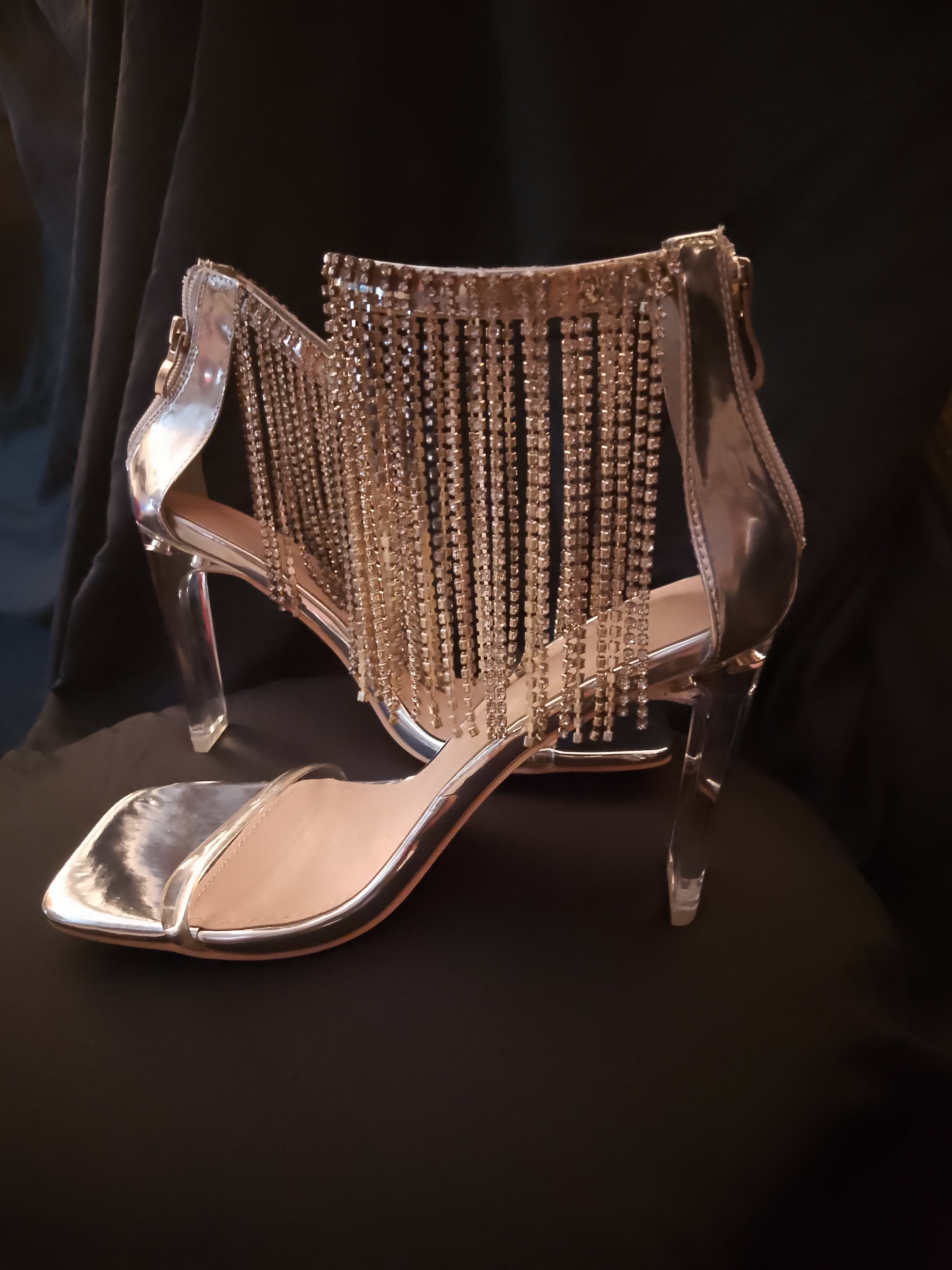 Platinum Sway To The Beat Cascade Tassel Clear Heel Pumps