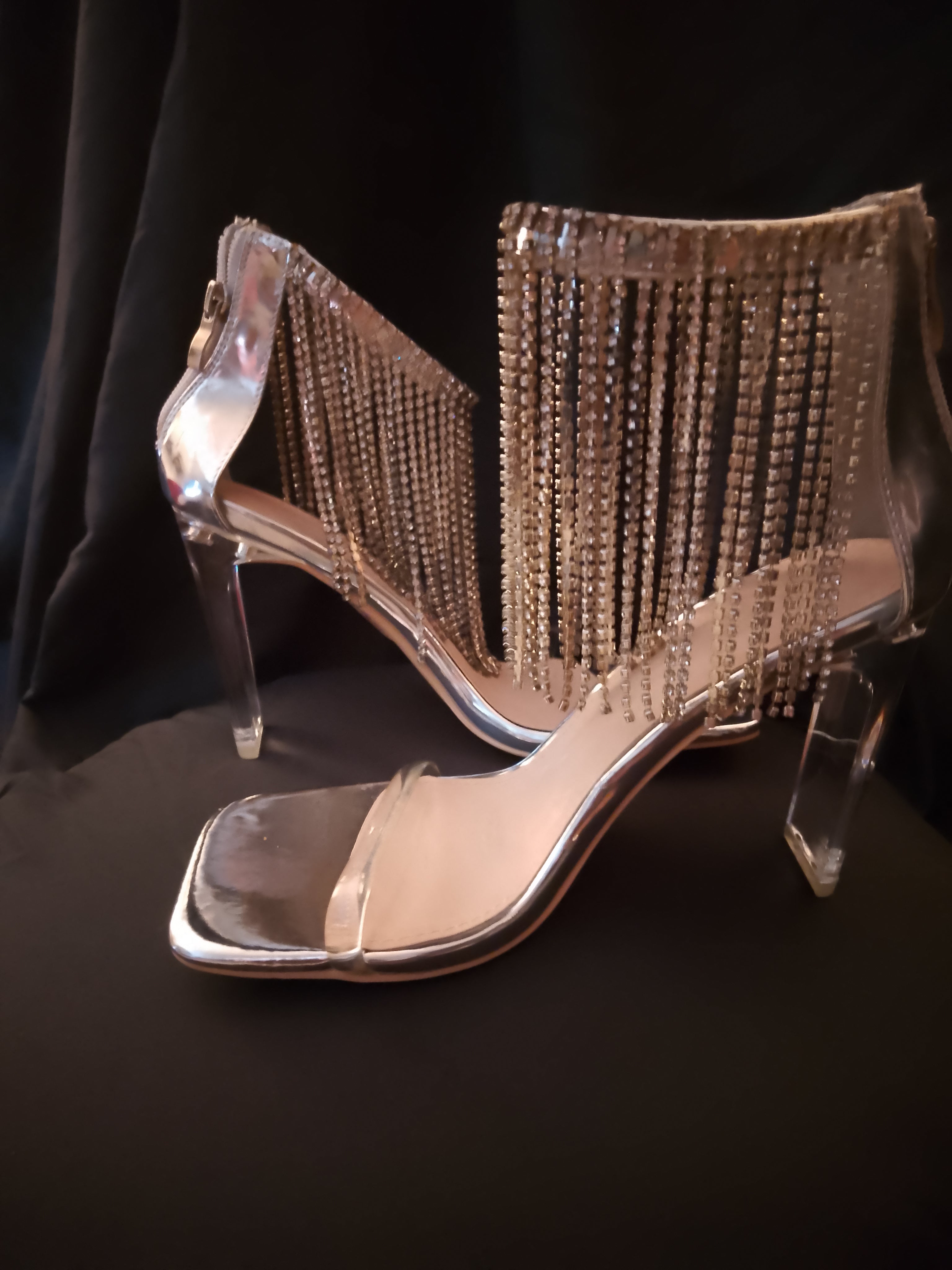 Platinum Sway To The Beat Cascade Tassel Clear Heel Pumps